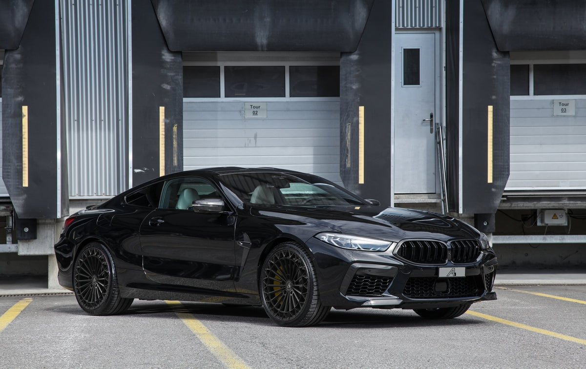 Kompletträder Felgen A1 CW55 schwarz  auf BMW
