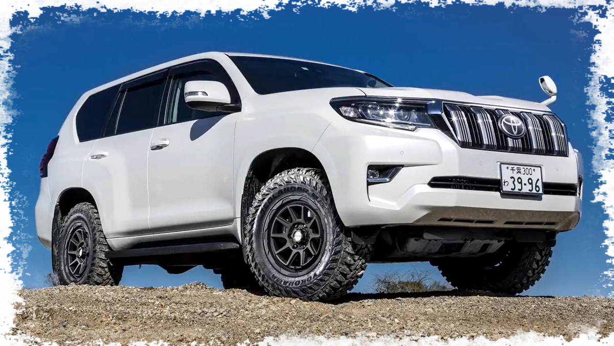 Kompletträder und Felgen WEDS Adventure Mud Vance 06 an einem Toyota Land Cruiser Auto.