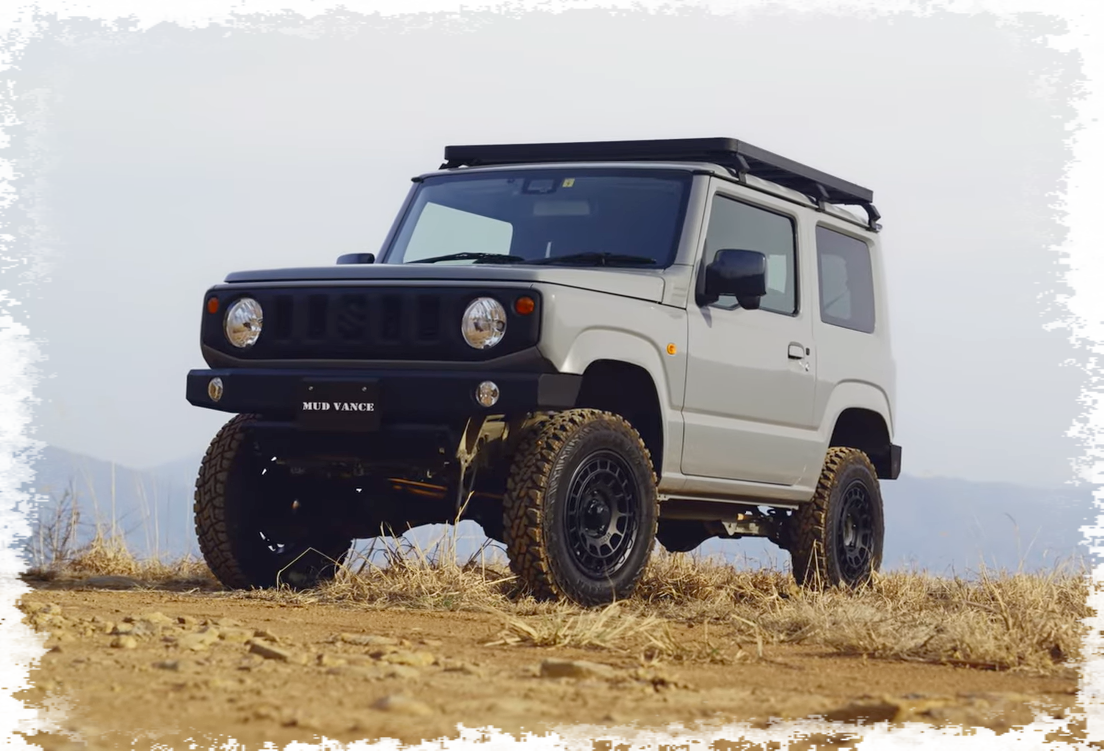 Kompletträder und Felgen WEDS Adventure Mud Vance X Typ F an einem Suzuki Jimny Auto.
